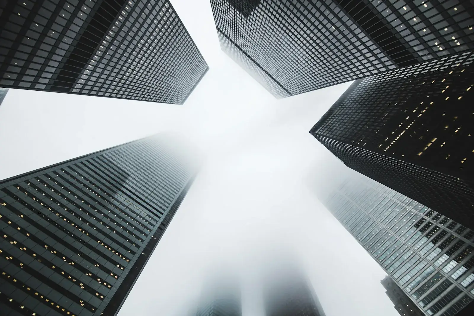 Glass towers photographed from street level